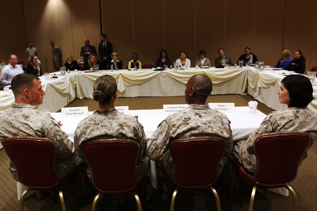 Four Marines sit on a panel to answer questions about the military life-style as students from the Leadership North County class learned about Camp Pendleton and its military personnel at the Pacific Views Events Center March 21.  