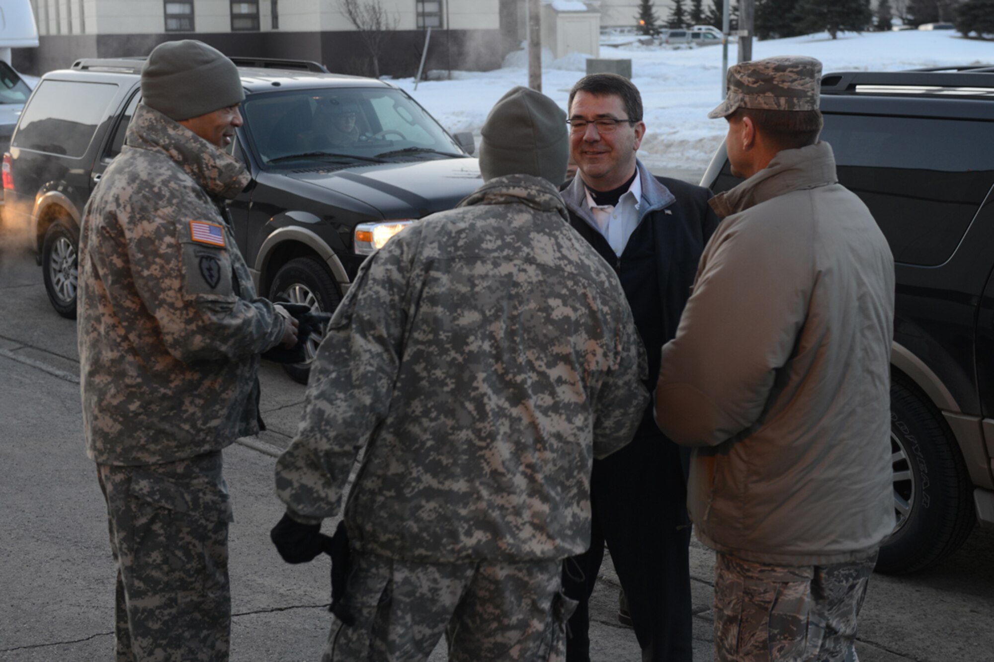 JOINT BASE ELMENDORF-RICHARDSON, Alaska -- JBER leadership welcomes Deputy Secretary of Defense Dr. Ashton Carter to JBER during his visit March 21. Carter is the principal civilian deputy to Secretary of Defense Chuck Hagel, and is appointed by the President, with the advice and consent of the Senate. (U.S. Air Force photo/Airman Ty-Rico Lea)