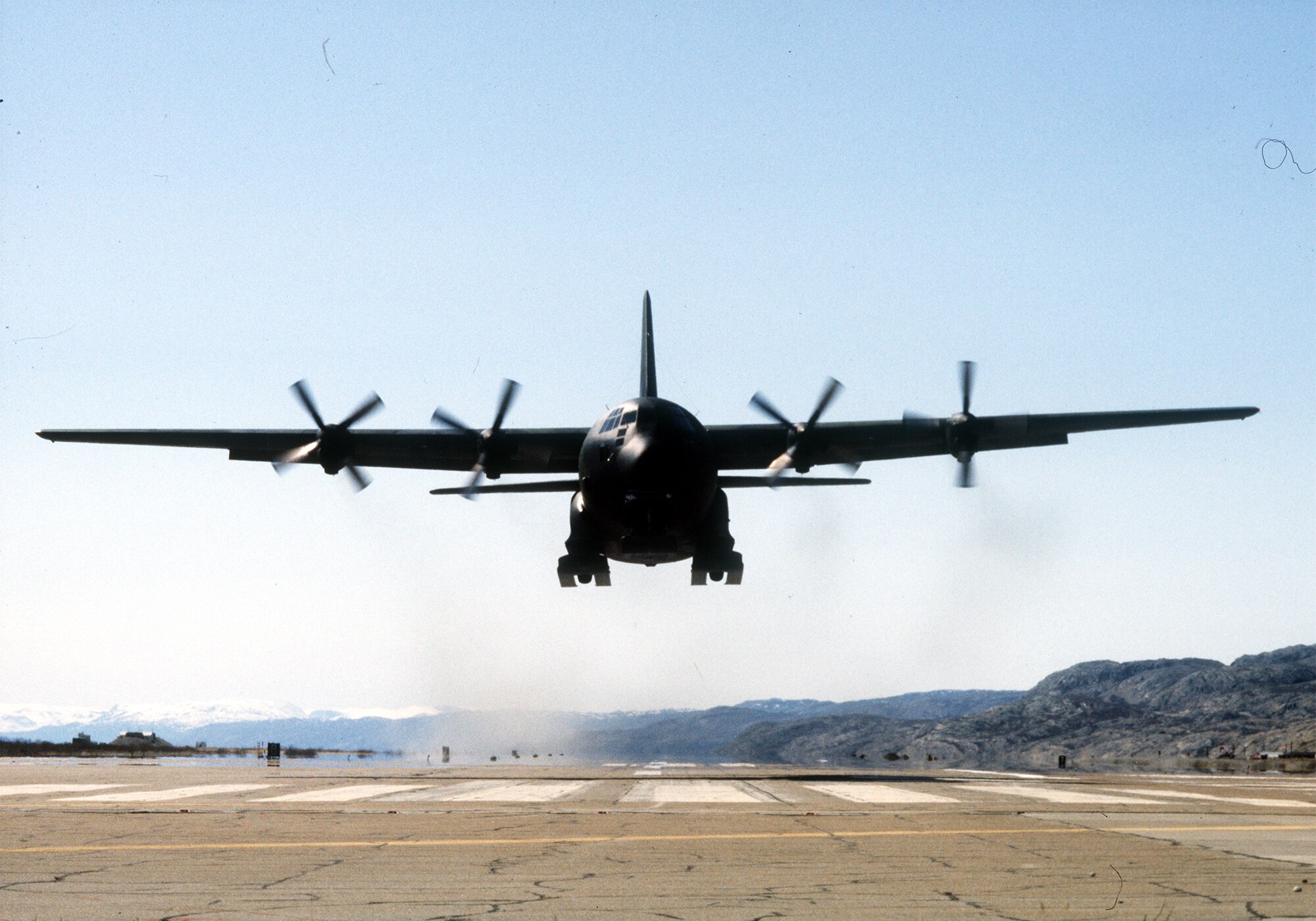 A 109th Tactical Airlift Group LC-130 takes off from Kangerlussuaq airport in Greenland in 1988 as the crew trains for snow landings in order to augment the Navy in the Antarctica in the coming months. (USAF Photo by MSgt Joe Pittelli/Released)