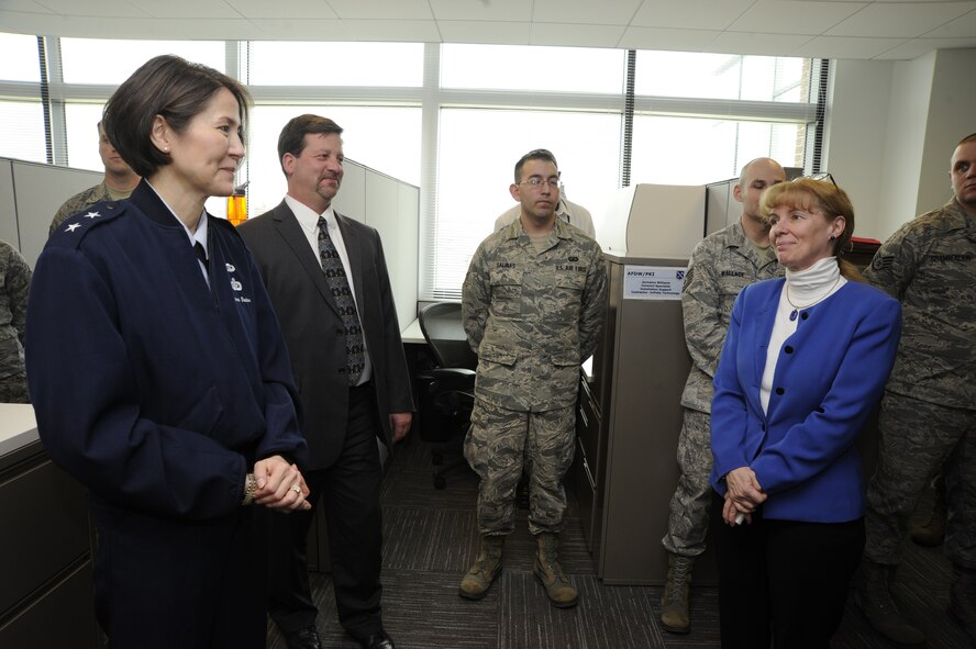 Air Force District of Washington Commander Maj. Gen. Sharon K.G. Dunbar and AFDW Contracting Deputy Director Elizabeth Hair congratulated the Headquarters AFDW contracting office for earning Air Force-level awards March 11, 2013 on Joint Base Andrews, Md. “The reason we won these awards is because we have dedicated, hardworking people who care about the mission,” Hair said. (U.S. Air Force photo by Staff Sgt. Christopher Ruano)