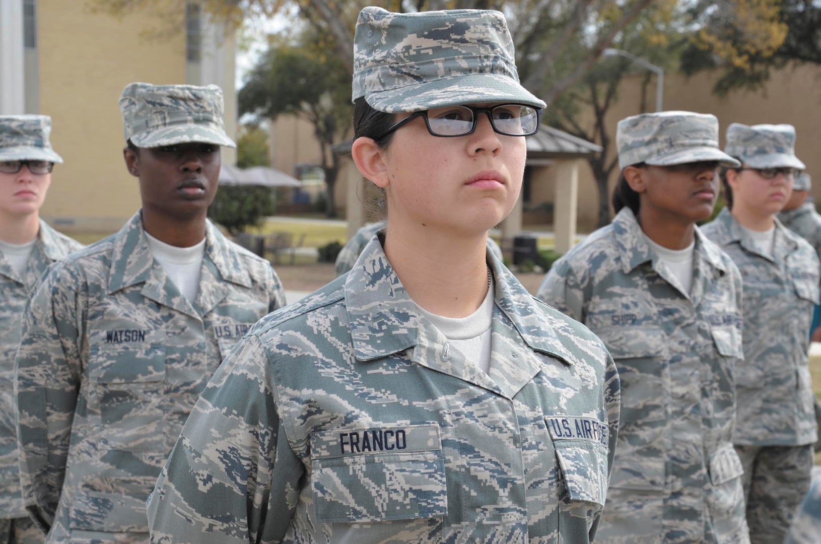 Trainee Kaycee Franco waits with her flight to enter the parade field for the March 7 Airman’s Coin Ceremony. (U.S. Air Force photo by Dona Fair/Released)