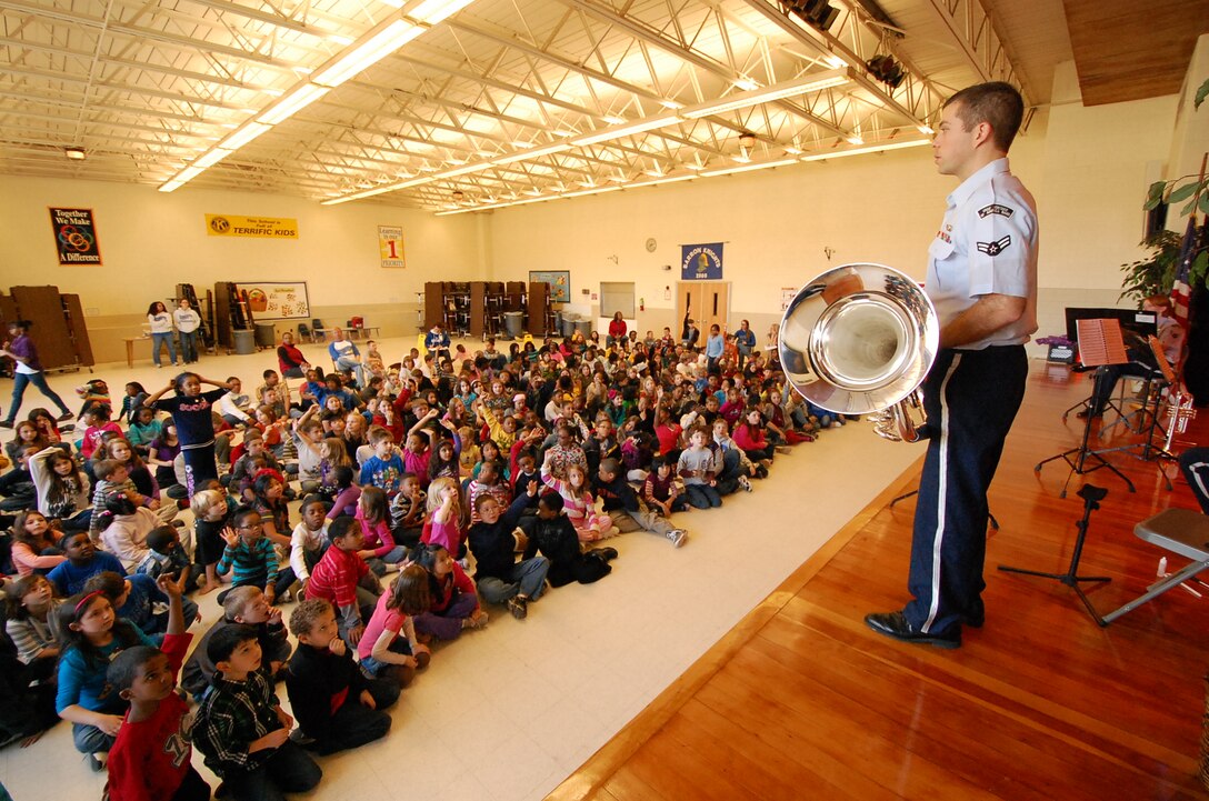 Elementary School concerts involve a question and answer session. Questions typically range from, "Can you put that tuba on your head?" to "What's it like to deploy?"