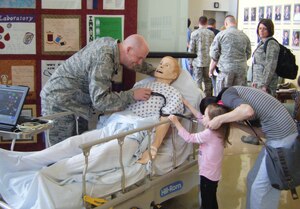 U.S. Air Force Maj. Kevin Skaggs, 366th Medical Group Director of Education Training, uses an emergency simulator to perform a safety demonstration for bystanders during National Patient Safety Awareness Week, March 13, 2013, at Mountain Home Air Force Base, Idaho. This is the eighth consecutive year the MDG has participated in the National Patient Safety Foundation’s Annual Educational and Awareness Campaign for Healthcare Safety. (U.S. Air Force photo/Marcia Vondran Lutz)


