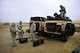 JOINT BASE MCGUIRE-DIX-LAKEHURST, N.J. – Members of the 571st Contingency Response Group assessment team prepare to load cargo onto a HMMWV during the Eagle Flag 13-1exercise, here, March 12, 2013.  (U.S. Air Force photo by Staff Sgt. Gustavo Gonzalez)