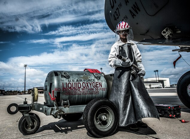 Airman 1st Class Nicholas McCracken, 437th Aircraft Maintenance Squadron crew chief, performs several maintenance tasks on the C-17 Globemaster III, including liquid oxygen transfers. Liquid oxygen is used as a means of distributing breathable air to aircrew members and passengers above 10,000 feet above sea level. The C-17 can hold approximately 155 gallons of LOX. (U.S. Air Force photo/Senior Airman Dennis Sloan)