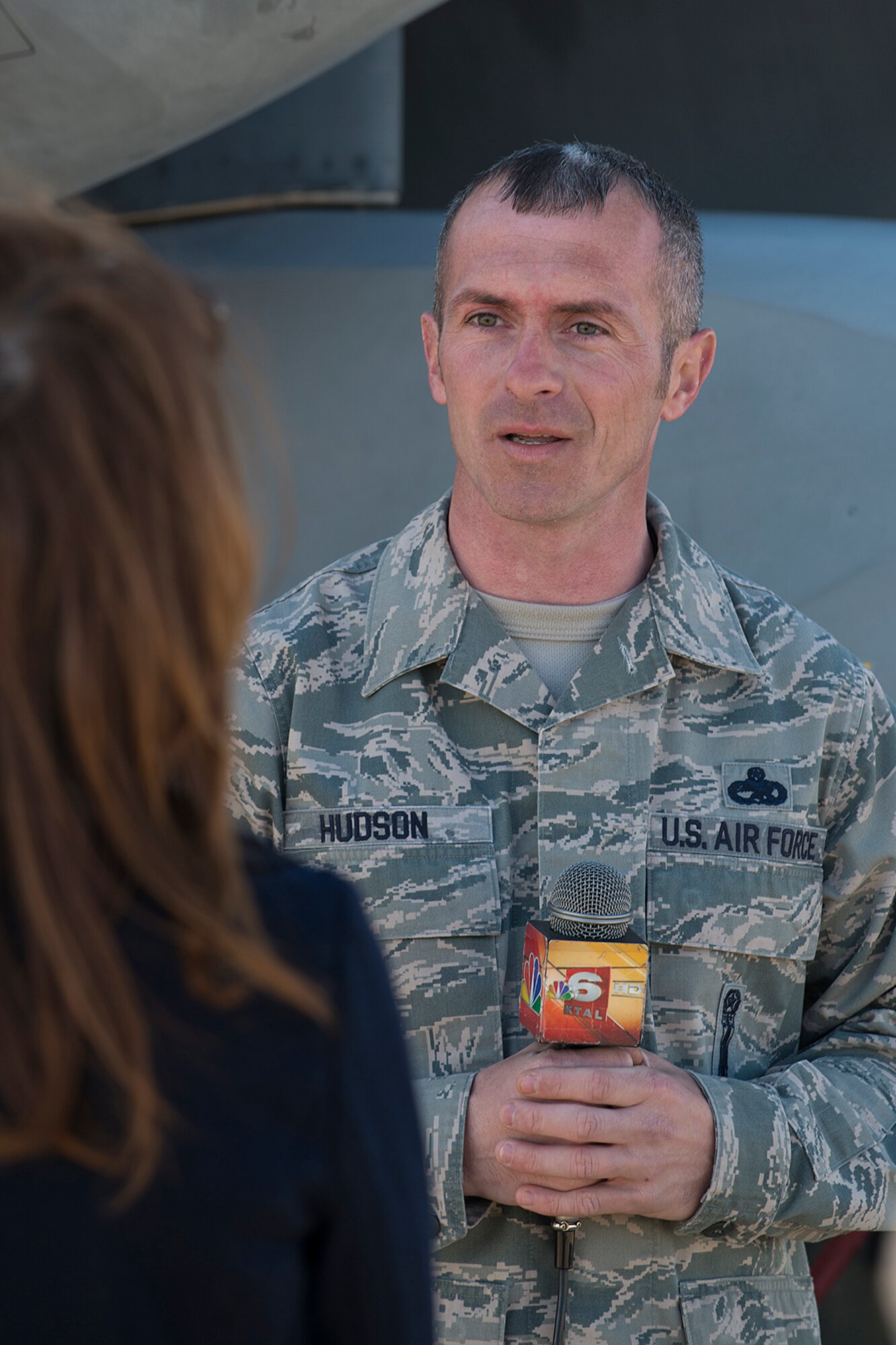 U.S. Air Force Master Sgt. James Hudson, 707th Maintenance Squadron Loading Standardization Crew team chief, is interviewed by Leslie Draffin, KTAL Channel 6 News reporter, Mar. 20, 2013, Barksdale Air Force Base, La. Hudson and his load crew received the "best-seen-to-date" rating during the 307th Bomb Wing's Initial Nuclear Surety Inspection. (U.S. Air Force photo by Master Sgt. Greg Steele/Released)
