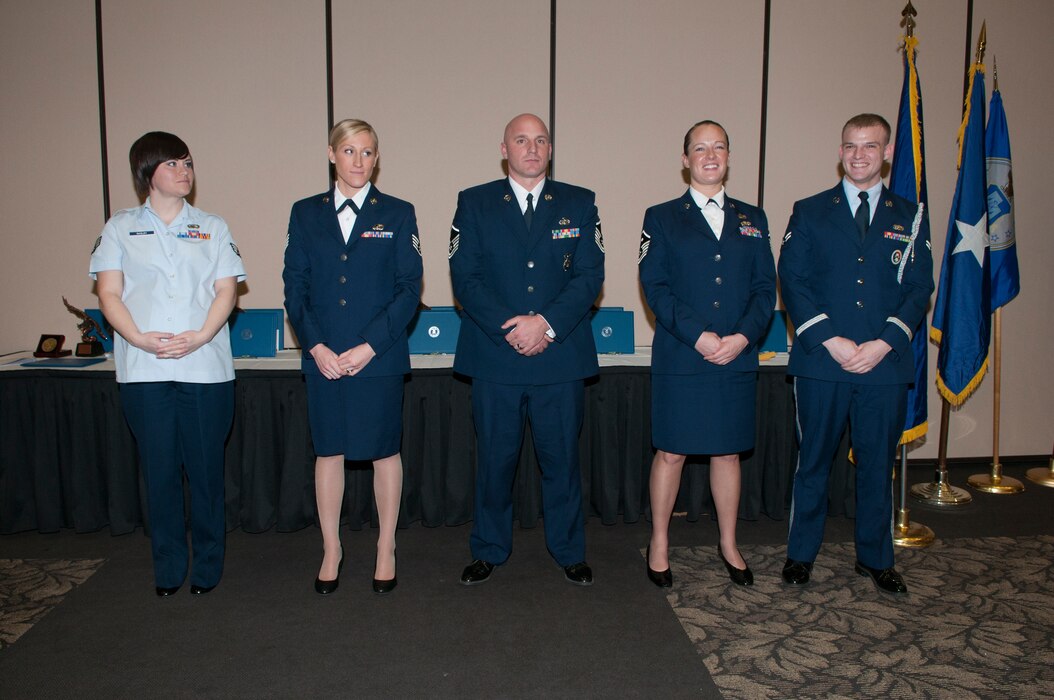 Five Utah Air National Guard members received Airman of the Year awards during a surprise awards banquet at Hill Air Force Base, Jan. 4. The 2012 award recipients are as follows. Airman of the Year: Senior Airman Rebecca Bagley, 130th Engineering & Installation Squadron. Noncommissioned Officer of the Year: Staff Sgt. Alisa Stanley, 151st Comptroller Flight.
Senior Noncommissioned Officer of the Year: Master Sgt. Mitchell Hooper, 151st Security Forces Squadron. First Sgt. of the Year: 1st Sgt. Vallaree McArthur, 151st Maintenance Squadron. Honor Guard Member of the Year: Airman 1st Class Colton Elliott, 151st Force Support Squadron. (Air Force photo by TSgt Kelly K. Collett. RELEASED)