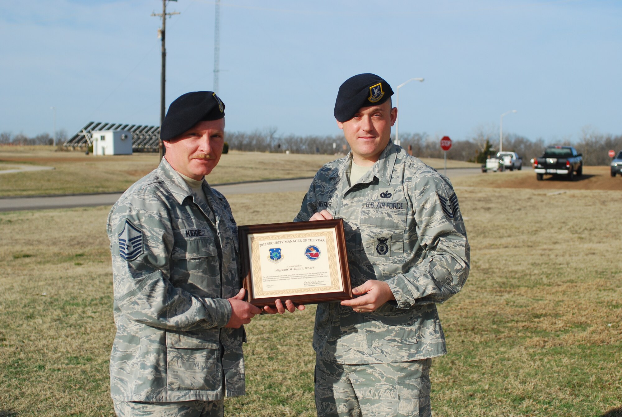 Master Sgt. Eric Kiddie, left, and Tech. Sgt. Ricky Buettner from the 507th Security Forces Squadron received the 72nd Air Base Wing 2012 Security Manager of the Year award on Feb. 20, 2013.  Kiddie and Buettner received zero write-ups during the yearly inspection, a feat accomplished by very few security managers each year.  They are the first security managers from the 507th Air Refueling Wing in over 10 years to win the award.  (U.S. Air Force Photo by Senior Airman Mark Hybers)