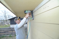 Air Force Master Sgt. Jason Hill, Joint Base San Antonio-Randolph, volunteers at a Habitat for Humanity of San Antonio construction site March 14. (U.S. Air Force photo by Joel Martinez)