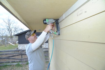 Air Force Master Sgt. Jason Hill, Joint Base San Antonio-Randolph, volunteers at a Habitat for Humanity of San Antonio construction site March 14. (U.S. Air Force photo by Joel Martinez)
