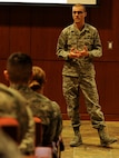 Second Lt. Seth Klint, 28th Contracting Squadron services and commodities flight officer in charge, answers questions from Airmen during an “Introduction to Commissioning” class at the Deployment Center at Ellsworth Air Force Base, S.D., March 15, 2013.  The class was hosted in an effort to educate enlisted Airmen about the various paths to commission in the U.S. Air Force. (U.S. Air Force photo by Airman 1st Class Hrair H. Palyan/Released)