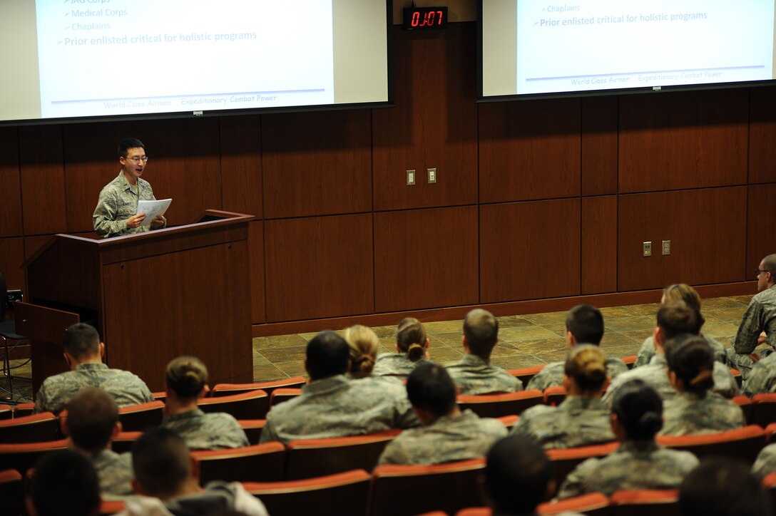 First Lt. Timothy Ramig, 28th Force Support Squadron food service officer, welcomes attendees during an “Introduction to Commissioning” class at the Deployment Center at Ellsworth Air Force Base, S.D., March 15, 2013. During the event, officers from a number of backgrounds explained how they earned their commissions, answered questions and helped Airmen prepare their packages for Officer Training School. (U.S. Air Force photo by Airman 1st Class Hrair H. Palyan/Released)