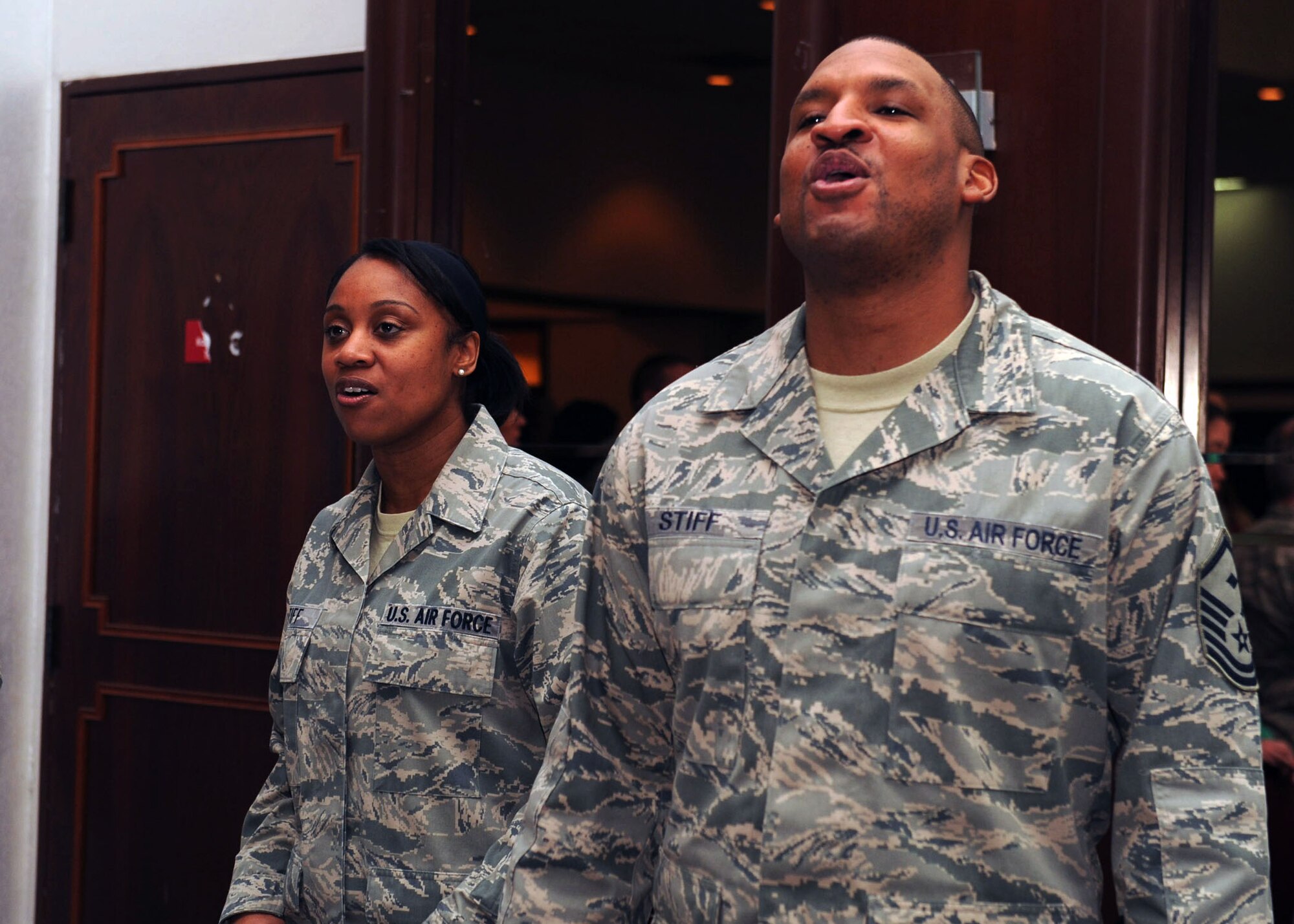 Master Sergeants Kevin and Tonetta Stiff, 39th Security Forces first sergeant and 39th Logistics Readiness Squadron operations and compliance superintendent, sing “God Bless America” during the Commander’s National Prayer Breakfast March 21, 2013, at Incirlik Air Base, Turkey. The chapel staff hosted the event, which included personal stories and prayers led by Incirlik Airmen. (U.S. Air Force photo by Staff Sgt. Marissa Tucker/Released)