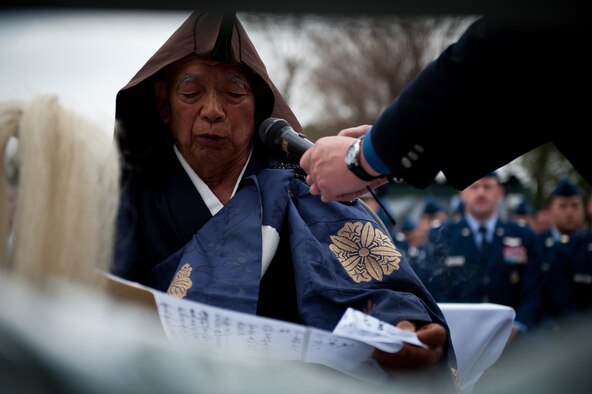 GUNMA PREFECTURE, Japan -- Shinyu Kizaka, temple priest and host of the event, recites a sutra during the unveiling of a memorial monument in honor of fallen B-29 aircrews March 20, 2013, at Gunma Prefecture, Japan. Kizaka was just 12 years old when the U.S. service members crashed in his home town, and 68 years later he helped honor the aircrew by using his temple as resting ground for the memorial. (U.S. Air Force photo by Senior Airman Cody H. Ramirez)