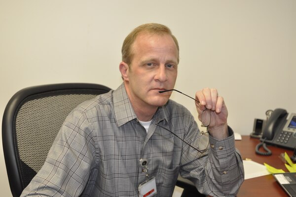 Jeff Mansfield, a quality management specialist in the U.S. Army Corps of Engineers Nashville District, works at his desk March 11, 2013.  He is the Nashville District Employee of the Month for January 2013.