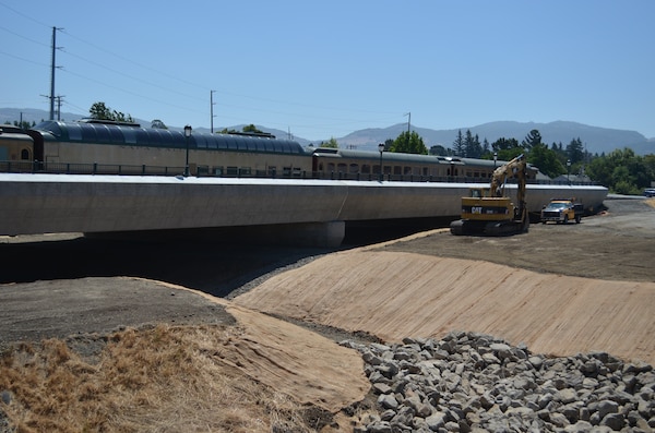 Construction crews wrap up work on a new railroad bridge in Napa, Calif., on July 10, 2012. The U.S. Army Corps of Engineers constructed a new bridge, elevating the tracks off the ground as much as six feet, in preparation for construction of a dry bypass channel that will divert water during flood events more quickly down the Napa River. The bridge was constructed as part of a $65 million American Recovery and Reinvestment Act of 2009 contract raised more than 3,300 feet of railroad track and replaced two bridges. The Napa River Flood Control Project is a joint effort of the Corps, city of Napa and the Napa Flood Control and Water Conservation District.  