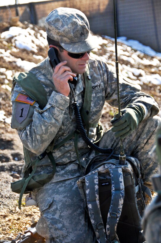 U.S. Army Sgt. Dustin Wright talks on a radio system during a mission readiness exercise in Hohenfels, Germany, March 16, 2013. Wright is assigned to the 3rd Squadron, 2nd Cavalry Regiment.