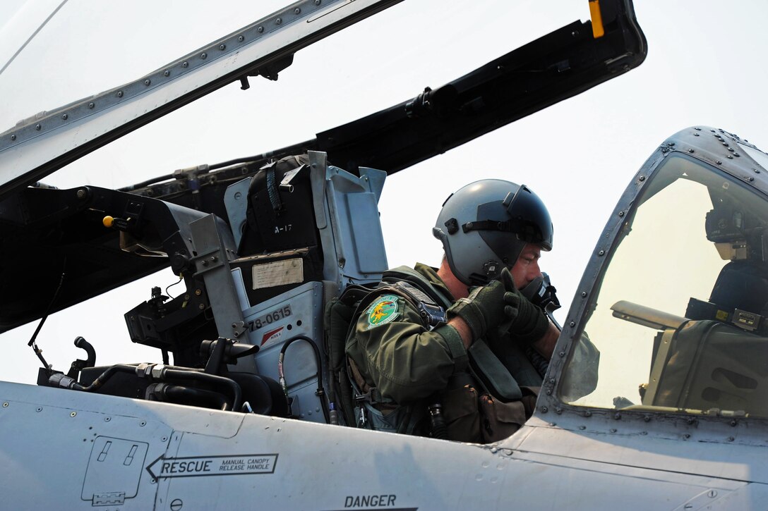 A U.S. Air Force A-10 Thunderbolt II pilot prepares for a mission during Cope Tiger 13 at Udon Thani Thai air force base, Thailand, March 15, 2013. The pilot is assigned to the 25th Fighter Squadron.