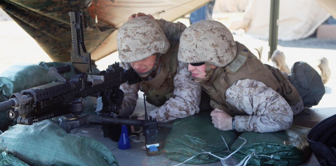 Marines and sailors with 2nd Marine Division, conducted a command post training exercise March 18-20, 2013, aboard Marine Corps Base Camp Lejeune. Lance Cpl. Edward Frost (left) and Cpl. Evan Laderer (right), both musicians, post security for the headquarters of the CPX.  (Official U.S. Marine Corps photo by Cpl. Phillip R. Clark)