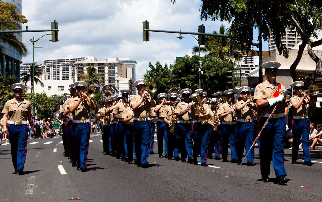 HONOLULU — Marines of the U.S. Marine Corps Forces, Pacific Band play the “Marines’ Hymn” while marching during the 45th annual St. Patrick’s Day parade in Waikiki, March 17. Thousands of tourists, local residents and spectators crowded the street to see the parade’s entertainment for the afternoon. While not a legal holiday in the U.S., St. Patrick’s Day is popularly celebrated across the country and other parts of the world. (U.S. Marine Corps photo by Cpl. James A. Sauter)