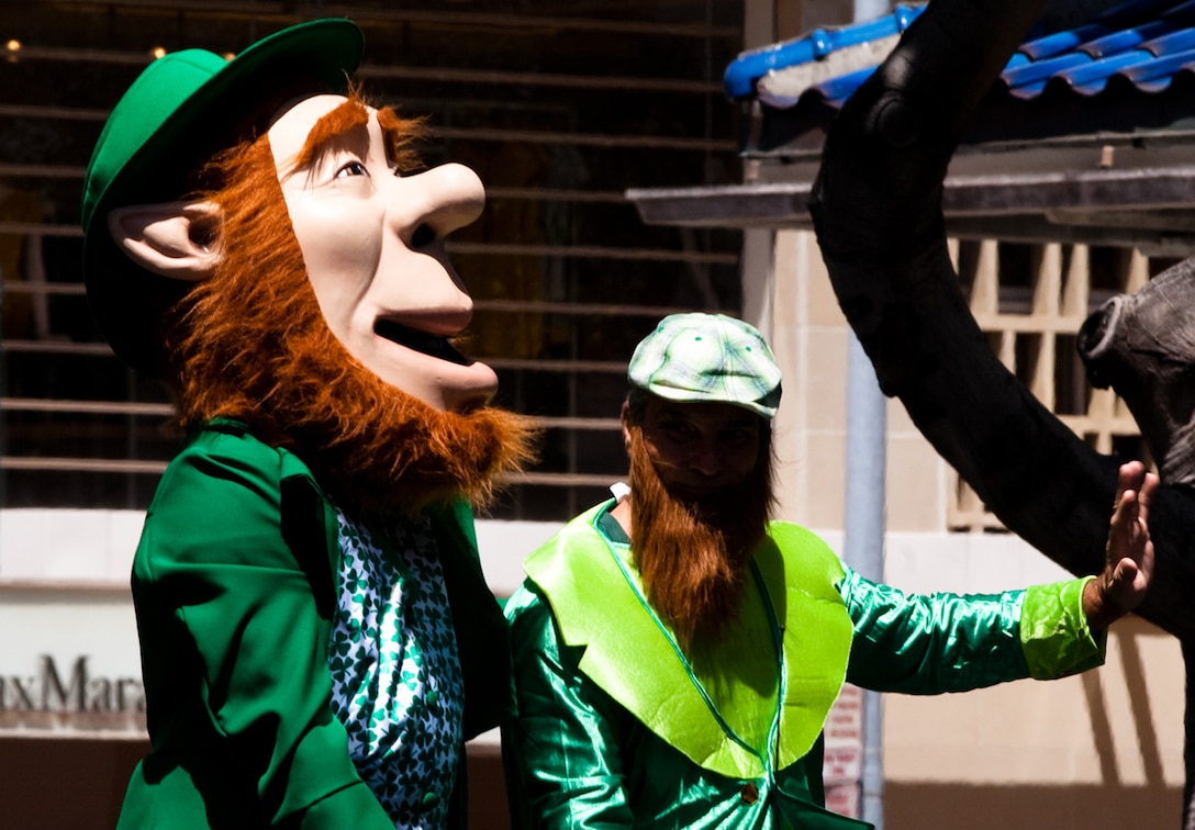 HONOLULU — A performer dressed in a leprechaun costume greets attendees during the 45th annual St. Patrick’s Day parade, March 17. Thousands of tourists, local residents and spectators crowded the street to see the parade’s entertainment for the afternoon. While not a legal holiday in the U.S., St. Patrick’s Day is popularly celebrated across the country and other parts of the world. (U.S. Marine Corps photo by Cpl. James A. Sauter) 
