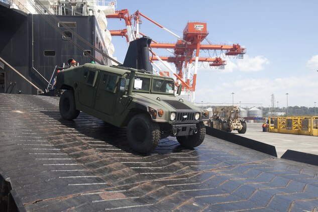U.S. Marines from 3D Marine Expeditionary Brigade, III Marine Expeditionary Force, offloaded a High Mobility Multipurpose Wheeled Vehicle pier-side from the USNS 1st Lt. Jack Lummus, March 21, during annual exercise Freedom Banner 2013 Maritime Prepositioning Force offload in Subic Bay, Republic of the Philippines. More than 270 Marine Corps tactical vehicles and amphibious assault vehicles were offloaded in support of FB13 and Balikatan 2013, an annual bilateral exercise that takes place in the Philippines. The MPF program supports global positioning of Marine Air-Ground Task Force and naval equipment and supplies in response to a range of military operations from the quick and rapid buildup of combat power to humanitarian assistance and disaster relief.