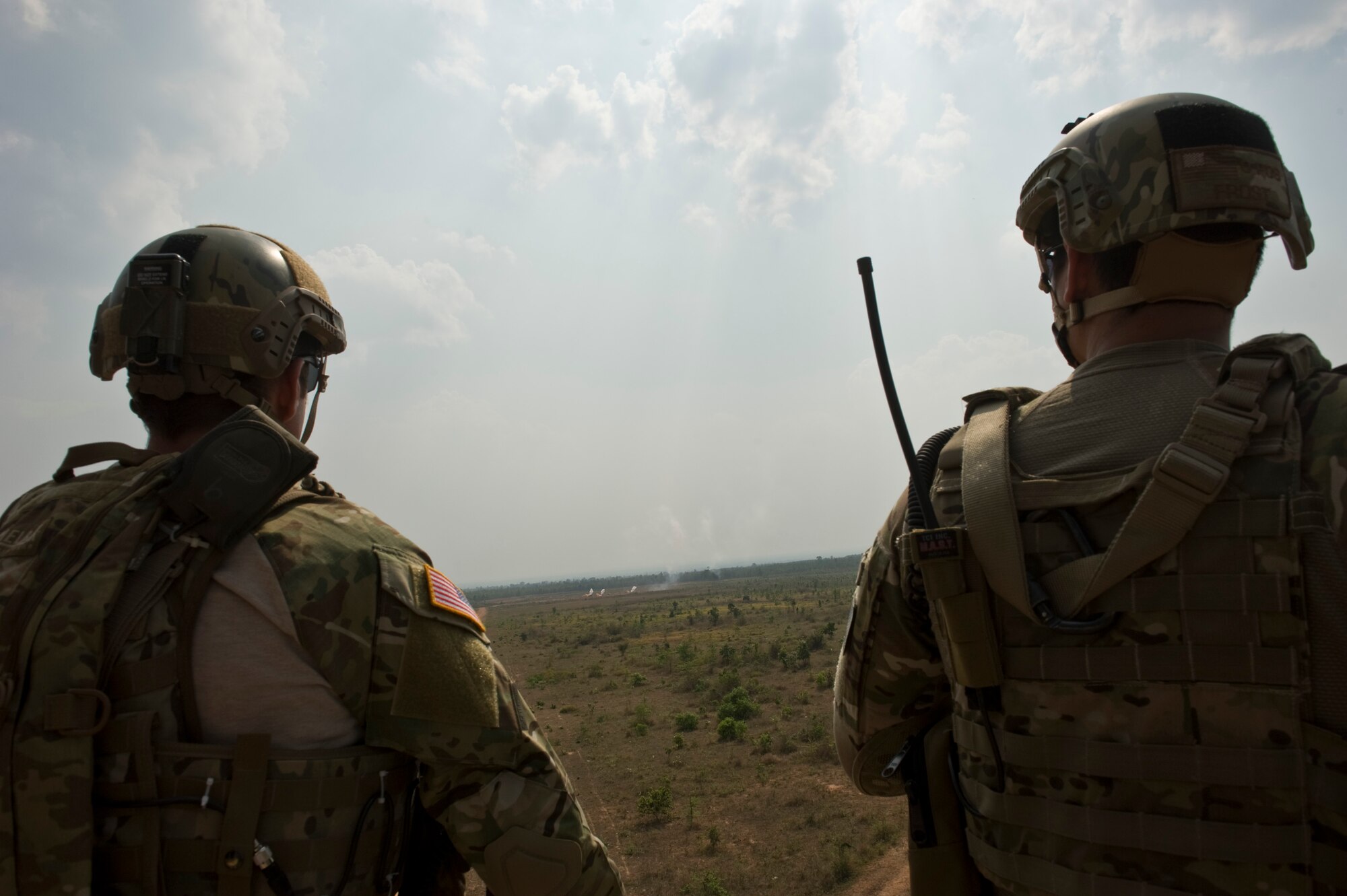 Joint Terminal Attack Controllers from the 3rd Air Support Operations Squadron look on as an A-10 Thunderbolt II strikes a target during a close air support mission Cope Tiger 13 at Nam Phong Royal Thai Air Base, Thailand, March 19, 2013. More than 300 U.S. service members are participating in CT13, which offers an unparalleled opportunity to conduct a wide spectrum of large force employment air operations and strengthen military-to-military ties with two key partner nations, Thailand and Singapore. (U.S. Air Force photo/2nd Lt. Jake Bailey)