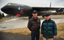 Retired Lt. Col. Francis Leslie and his son Tom who retired as an Air Force colonel, pose in front of a static display of a B-52 at Heritage Park on Fairchild Air Force Base, Wash., March 1, 2013. Tom, alike his father, flew B-52 missions during wartime. (U.S. Air Force photo by Senior Airman Earlandez Young)  