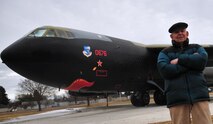 Former B-52D Stratofortress radar operator, (Ret) Lt. Col. Francis Leslie, poses in front of a static display of a B-52 at Heritage Park on Fairchild Air Force Base, Wash., March 1, 2013. Leslie turned 90 years old Feb. 28 and decided to celebrate by traveling to Fairchild where he once served as an Airman. Leslie also served in World War II, where he flew 33 missions until the war ended in 1945. (U.S. Air Force photo by Senior Airman Earlandez Young)  