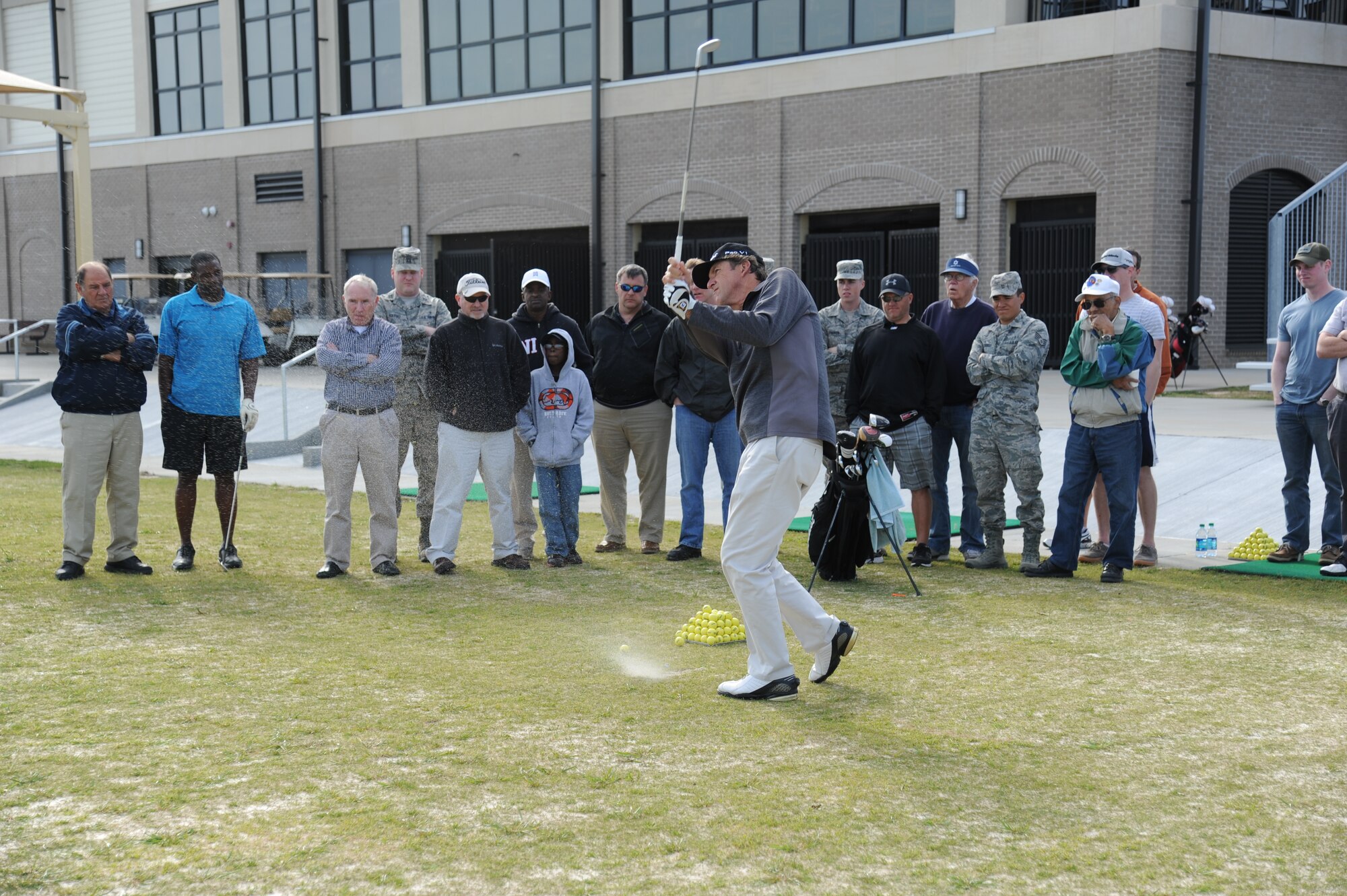Steve Jones, golf pro, holds a free golf clinic at the Bay Breeze Event Center March 21, 2013, at Keesler Air Force Base, Miss.  Jones was the 1996 U.S. Open Champion and is competing in the Mississippi Gulf Coast Classic this weekend.  (U.S. Air Force photo by Kemberly Groue)