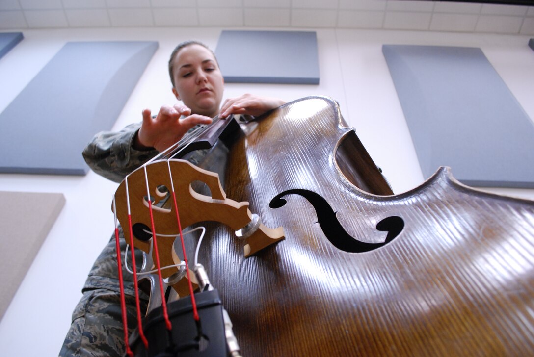 A1C Emily Wheaton is the bassist for the Rhythm in Blue Jazz Ensemble.  Here she rehearses in preparation for some local performances.