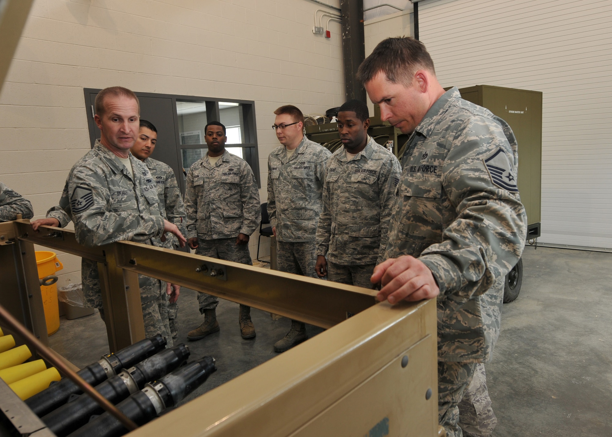 NEW LONDON, N.C. – During a Mission Essential Equipment Training class held in March 2013, Master Sgt. Christopher R. Speagle, Prime BEEF Manager, 145th Civil Engineering Squadron demonstrates operations on a piece of equipment called a Primary Switching Center. The class taught at the 145th North Carolina Air National Guard Regional Training Site in New London, N. C., was a mixture of Active and Guard personnel. Member's home stations included Charleston and Whiteman Air Force Base and the Oklahoma Air National Guard. (National Guard photo by Tech. Sgt. Patricia Findley, 145th Public Affairs)

