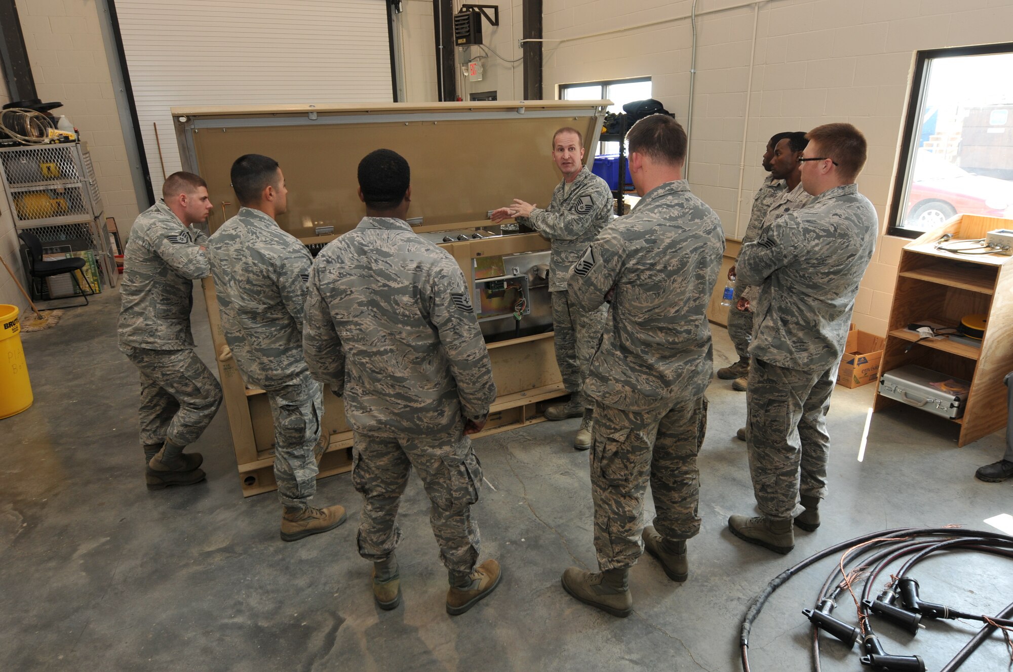 NEW LONDON, N.C. – During a Mission Essential Equipment Training class held in March 2013, Master Sgt. Christopher R. Speagle, Prime BEEF Manager, 145th Civil Engineering Squadron demonstrates operations on a piece of equipment called a Primary Switching Center. The class taught at the 145th North Carolina Air National Guard Regional Training Site in New London, N. C., was a mixture of Active and Guard personnel. Member's home stations included Charleston and Whiteman Air Force Base and the Oklahoma Air National Guard. (National Guard photo by Tech. Sgt. Patricia Findley, 145th Public Affairs)

