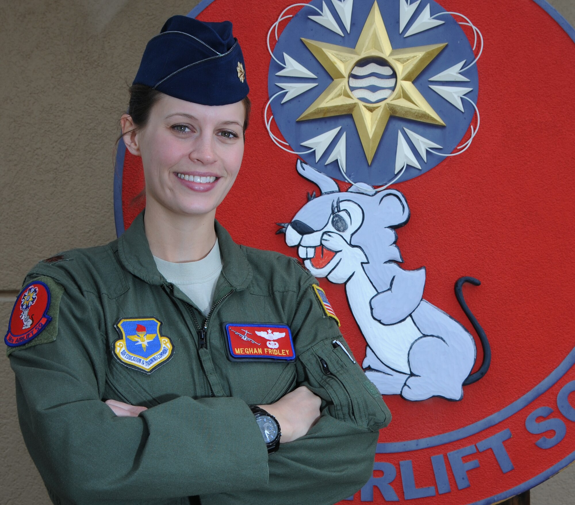 ALTUS AIR FORCE BASE, Okla. – Maj. Meghan Fridley, 58th Airlift Squadron C-17 Globemaster III evaluator pilot, shares her experiences as a woman serving in the Air Force, March 19, 2013. Fridley shared her journey to becoming a female Air Force pilot, including her trials and successes. (U.S. Air Force photo by Airman 1st Class Klynne Pearl Serrano / Released)