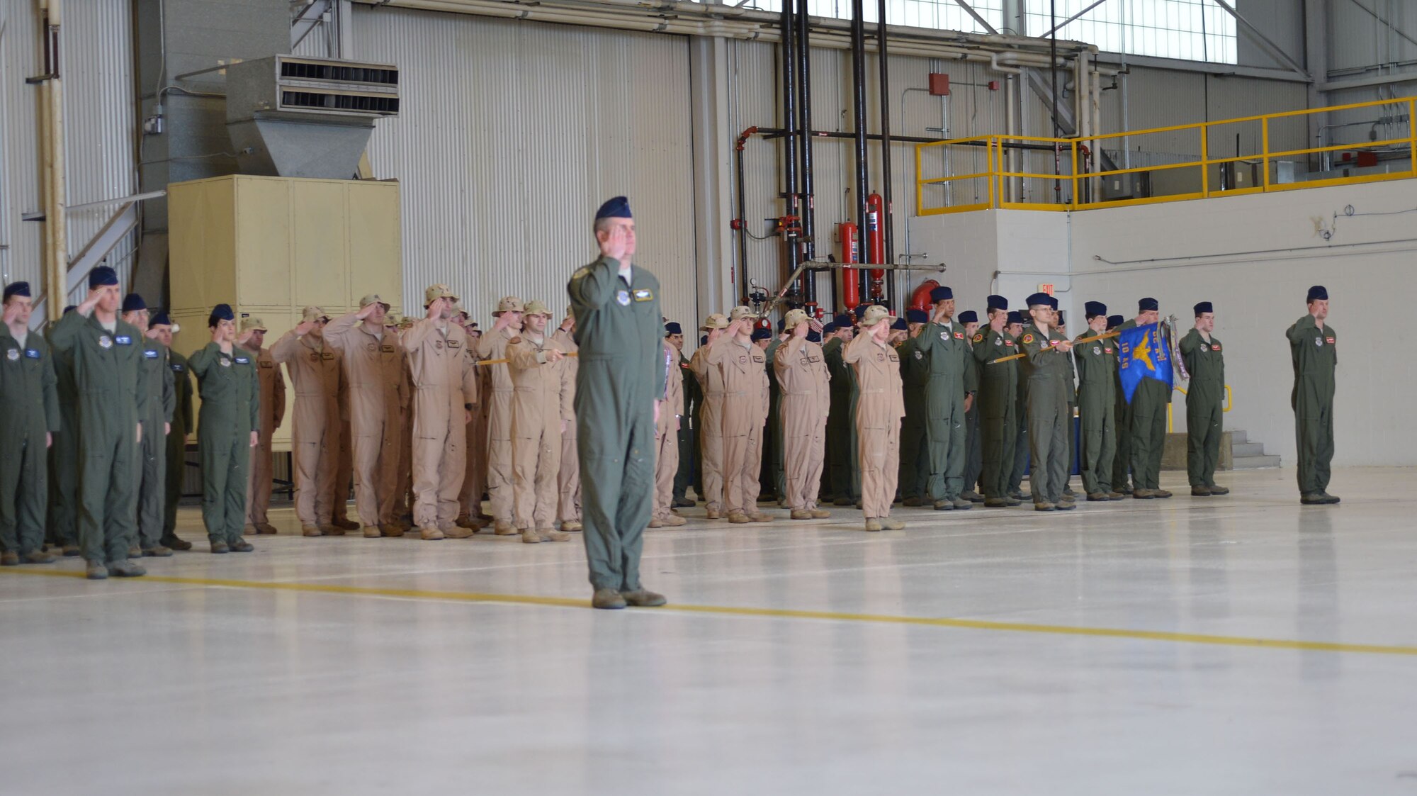 Members of the 62nd Operations Group render a salute to Col. Andrew Hird for the first time as the new 62nd OG commander during the 62nd OG change of command ceremony March. 21, 2013, at Joint Base Lewis-McChord, Wash. Hird commissioned in the Air Force in 1991 after graduating from the U.S. Air Force Academy, Colo. He is a command pilot with more than 4,000 flight hours and has flown combat missions in Operations Deliberate Force, Allied Force, Enduring Freedom and Iraqi Freedom. (U.S. Air Force photo/Airman 1st Class Jacob Jimenez)