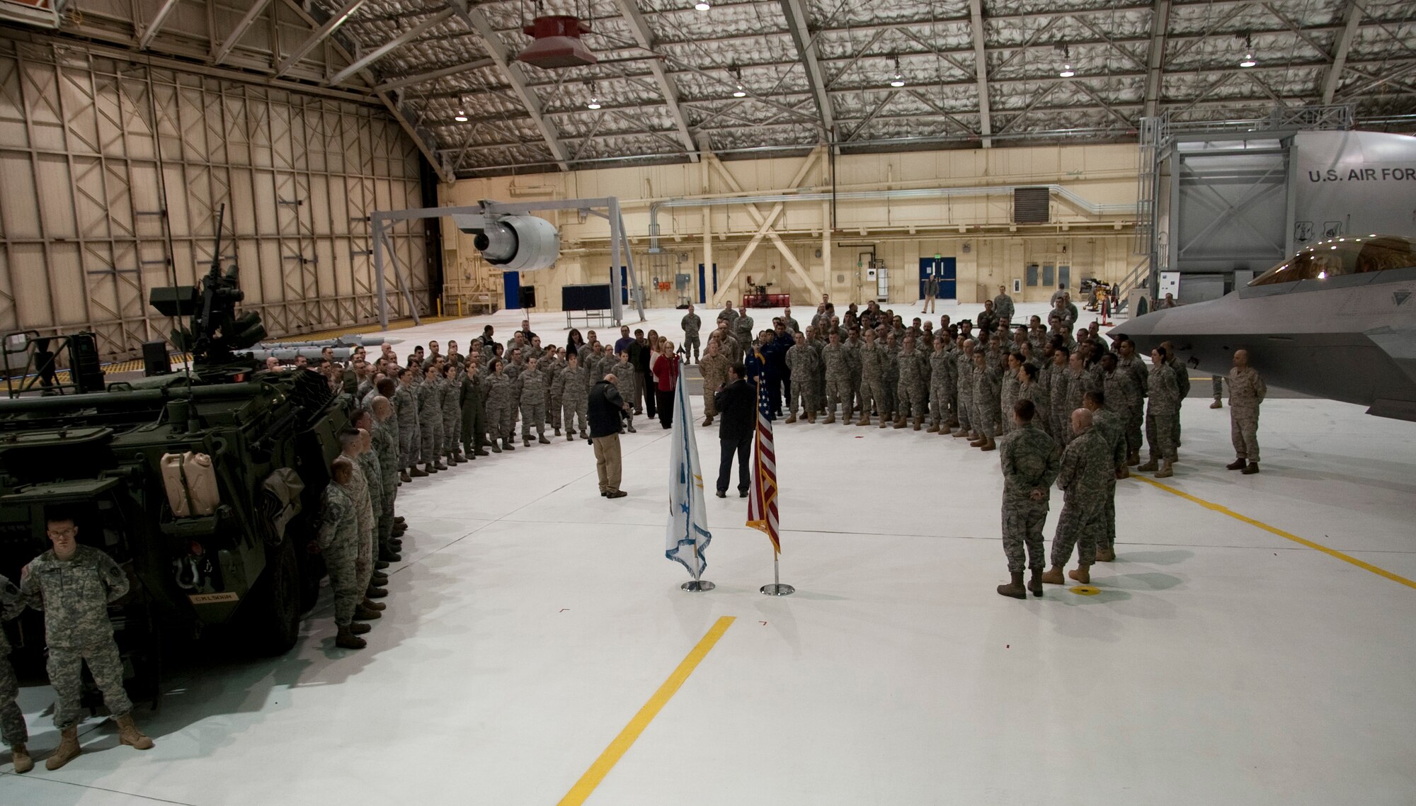 More than 150 Soldiers, Marines, Airmen and Cost Guardsmen listen to U.S. Deputy Defense Secretary Dr. Ashton Carter on Joint Base Elmendorf-Richardson, March 21. Carter used his visit to JBER to give thanks and praise to all JBER service members. 