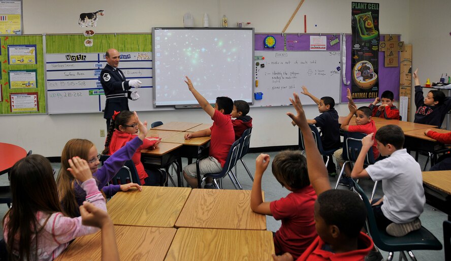 Master Sgt. Francisco Navarro, Homestead Air Reserve Base honor guard chief, discusses a career in the Air Force with fourth and fifth graders from Redland Elementary School in Homestead, Fla., during the school’s career day March 21. (U.S. Air Force photo/Tim Norton)