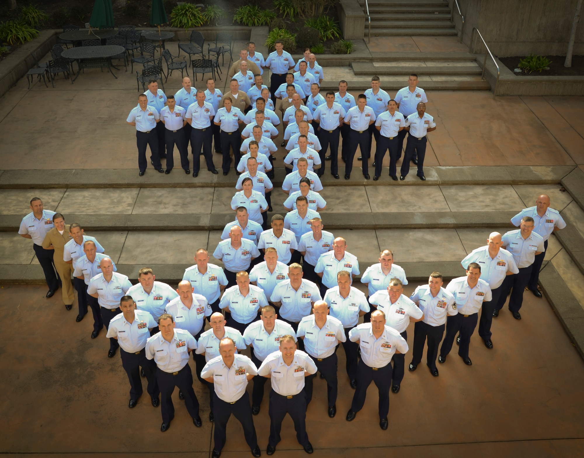 Class 193, made up of 64 Coast Guard chiefs, four Navy chiefs and four Air Force master sergeants form into an anchor at Coast Guard Training Center Petaluma, Calif., Feb. 26, 2013. Over a five-week “senior NCO” course, the students learned professionalism, self-awareness, leadership, communications, strategic thinking, education, lifelong learning, health and wellness, and community service. (Courtesy photo)