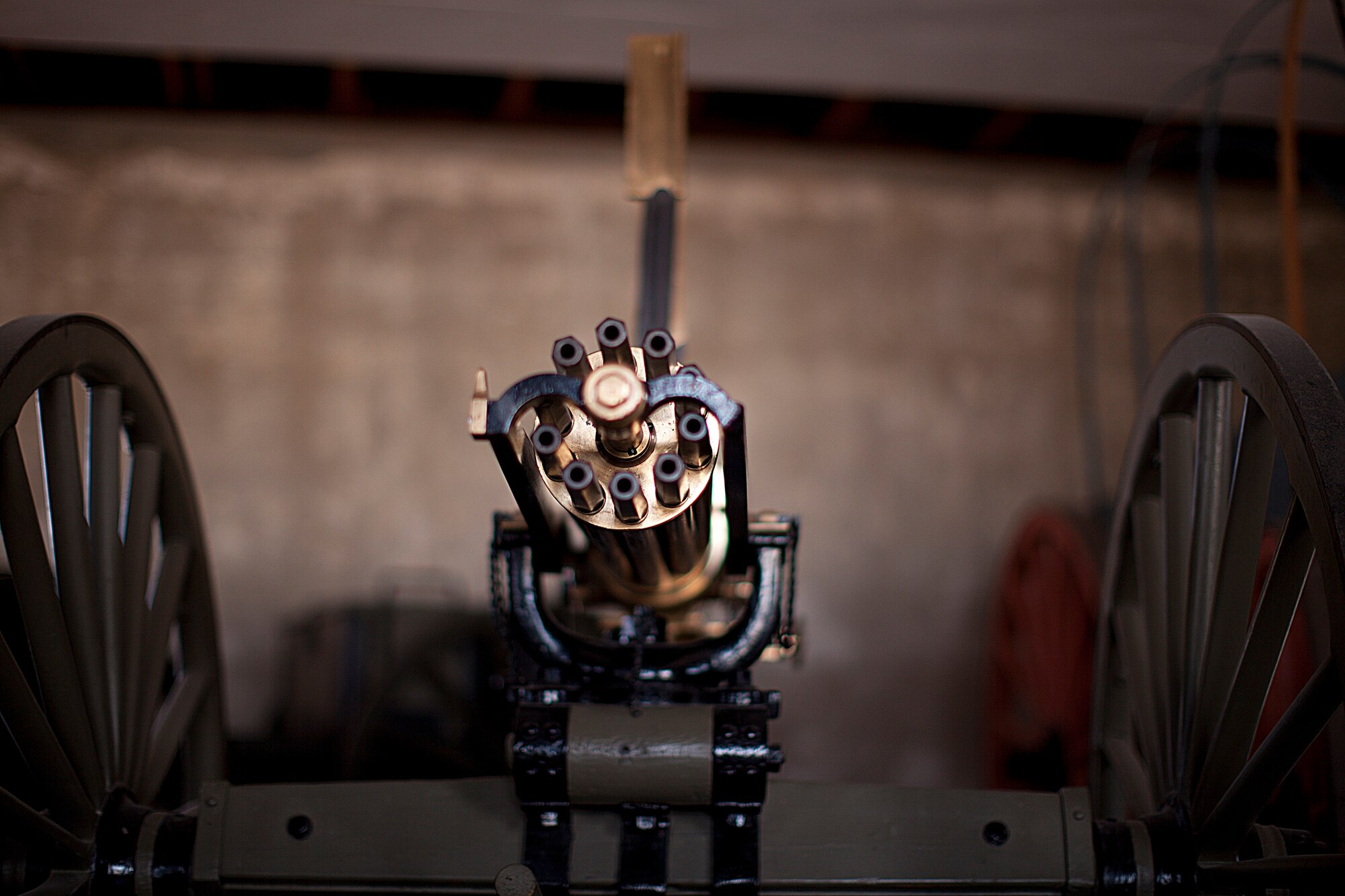 A Gatling gun sits on display in the armory building on Fort Laramie. Solitary confinement was housed directly below this floor. (U.S. Air Force photo by Matt Bilden)