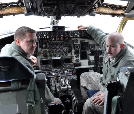 Tech. Sgt. Jason Cameron (left) and Staff Sgt. Jordan Clocher discuss a course of action in maintenance troubleshooting on a KC-135 Stratotanker with 2nd Lt. Jonathan Sih (not pictured) March 22, 2013. All three Airmen are assigned to the 100th Aircraft Maintenance Squadron, RAF Mildenhall, England. Cameron is a Columbia, Mo., native; Clocher is a Fayetteville, N.C., native; and Sih is a Carrollton, Texas, native. Airmen and aircraft deployed from the 100th Air Refueling Wing to southwest Europe as the 351st Expeditionary Air Refueling Squadron Jan. 26, 2013. In less than two months, the 351st EARS has completed more than 110 sorties supporting French fighter aircraft conducting operations in Mali. The sorties include more than 1,000 receiver contacts and more than 5 million pounds of fuel transferred. (U.S. Air Force photo by Capt. Jason Smith)