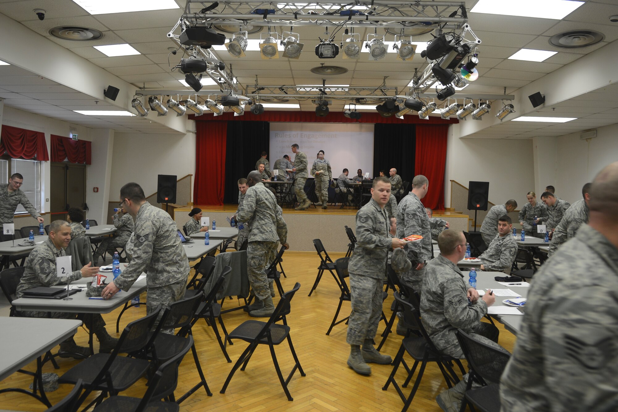 Airmen switch tables during a “Top 3 Lunch and Learn” speed mentorship event at Aviano Air Base, Italy, March 20, 2013. The event gave Airmen a chance to be mentored by senior enlisted members and ask questions on their career progression, the Air Force and personal matters. (U.S. Air Force photo /Senior Airman Jessica Hines)