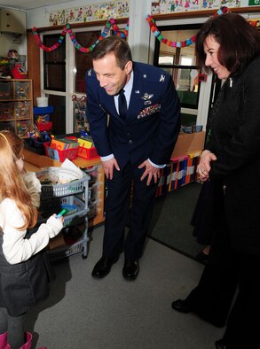 Center, Col. Christopher Kulas, 100th Air Refueling Wing commander, and his wife Nicole, chat to Avalon Martin, 5, during their tour of Great Heath Primary School March 19, 2013, in Mildenhall, England.  The installation commander visited the local school, which is host to many American children living in the local area, and spoke with the head teacher and staff about RAF Mildenhall and its mission. (U.S. Air Force photo by Karen Abeyasekere/Released)