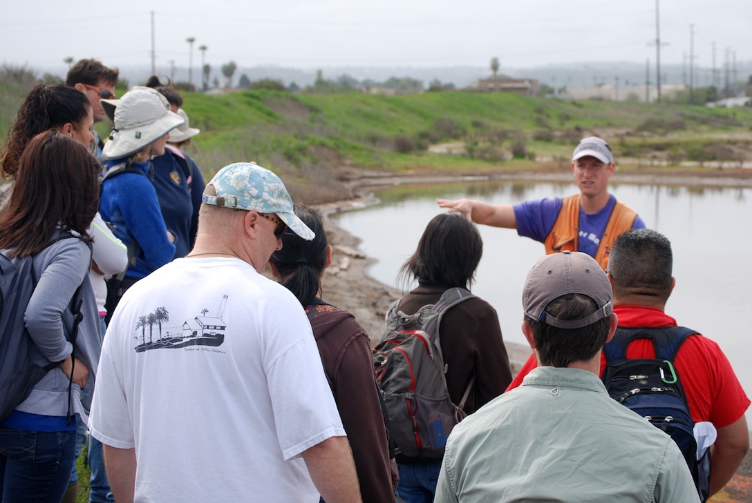 Jacob Berkowitz, a research soils scientist at the Corps' Engineer Research and Development Center in Vicksburg, Miss., describes the process for evaluating soils during a March 20, 2013 training site visit to Pond 20, a former salt mining area, in San Diego Bay.