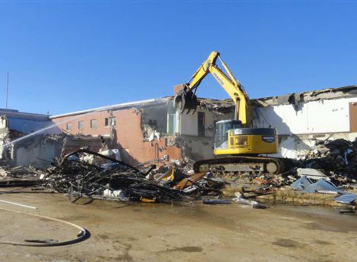 Workers destroy the Tuscaloosa Army Reserve Center which saw extensive damage by a tornado that ripped through Tuscaloosa, Ala., in April 2011. A new $13 million, 67,0000 square foot facility replaced the old facility.

