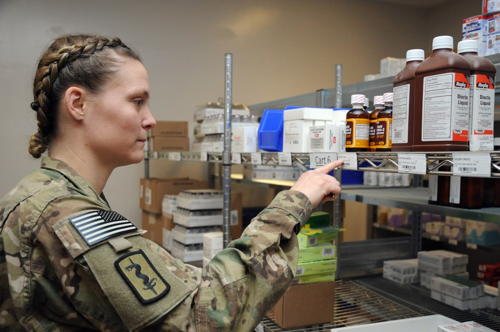 Senior Airman Elaine Green, 455th Expeditionary Medical Support Squadron medical logistics technician, inventories medications at the Craig Joint Theater Hospital on Bagram Airfield, Afghanistan, March 20, 2013. Green oversees monthly medical deliveries worth $390,000 to the CJTH. (U.S. Air Force photo/Staff Sgt. David Dobrydney)