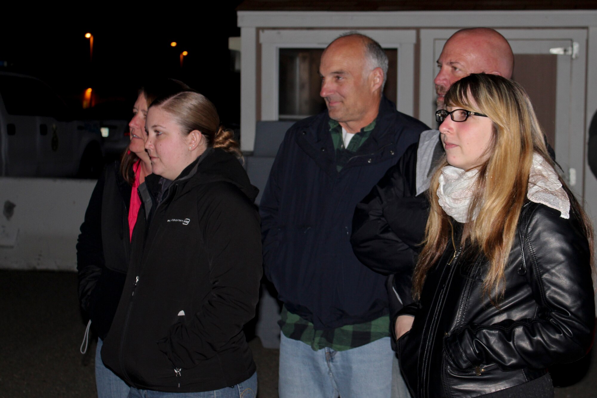 VANDENBERG AIR FORCE BASE, Calif. – Family and friends of 12 30th Security Forces Squadron members gather to say farewell at 2 a.m. here Sunday, March 24, 2013. The 30th SFS is the most highly tasked Security Forces unit in the Air Force, with 100 to 150 Airmen deployed per year from the base. (U.S. Air Force photo/2nd Lt. Kaylee Ausbun)