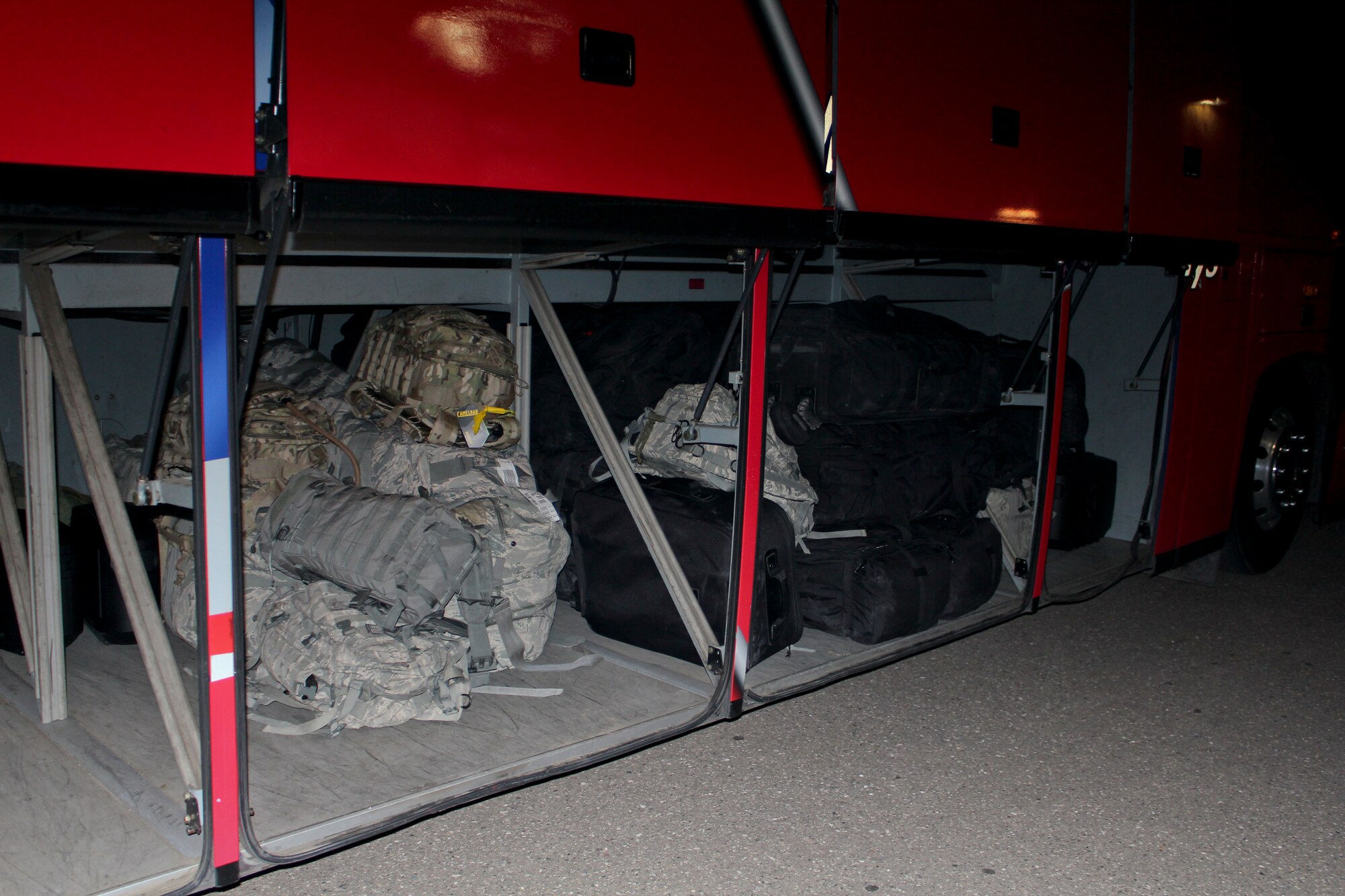 VANDENBERG AIR FORCE BASE, Calif. – Members of the 30th Security Forces Squadron stack their bags on a bus to depart here for a deployed location Sunday, March 24, 2013. The 30th SFS is the most highly tasked Security Forces unit in the Air Force, with 100 to 150 Airmen deployed per year from the base. (U.S. Air Force photo/2nd Lt. Kaylee Ausbun)