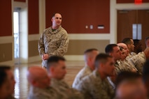 Gunnery Sgt. John H. Scanlan, a cyber defense manager with 2nd Marine Logistics Group, speaks to a group of Marines about the importance of information security during a class aboard Camp Lejeune, N.C., March 18, 2013. Scanlan discussed some of the current challenges to information security and methods the Marines can use to protect sensitive data from outside threats.