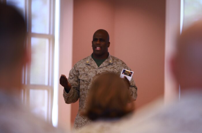 Maj. LeRon E. Lane, the communications officer with 2nd Marine Logistics Group, speaks to servicemembers about the importance of information security during a class aboard Camp Lejeune, N.C., March 18, 2013. Lane shared some of his own experiences with threats to information security to help prepare the Marines for the challenges of protecting sensitive materials they may encounter during their day-to-day operations.