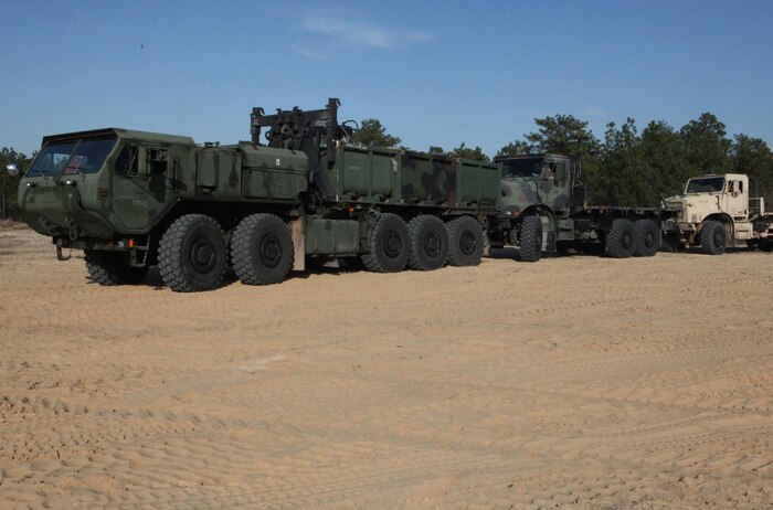 Tactical vehicles that belong to 2nd Marine Logistics Group’s logistics combat element line up after a resupply mission with 10th Marine Regiment, 2nd Marine Division during the joint training exercise Rolling Thunder at Fort Bragg, N.C., March 14, 2013. A logistics combat element with 2nd MLG provided 10th Marines with supplies and equipment-maintenance support during the 19-day exercise. 
